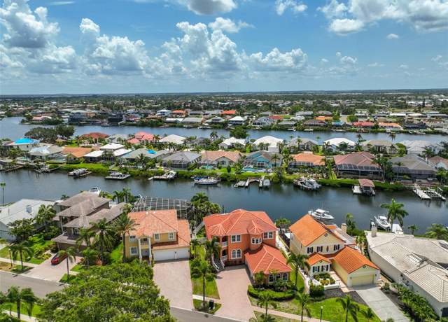 Property at 920 Symphony Isles Blvd, Apollo Beach, FL 33572, 4 beds, 3.5 baths
