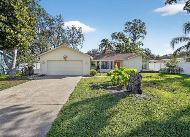 Property at 7822 Holiday Dr, Spring Hill, FL 34606, 3 beds, 2 baths