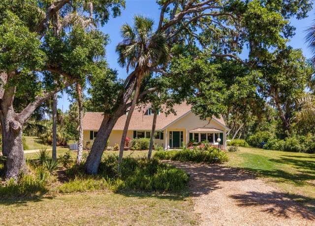Property at 2020 E Dolphin Dr, Englewood, FL 34223, 4 beds, 3 baths