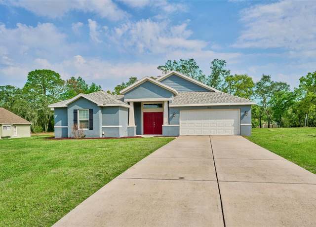 Property at 12037 Conway St, Spring Hill, FL 34609, 4 beds, 3 baths