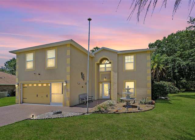 Property at 124 Lindsay Dr, Palm Coast, FL 32137, 4 beds, 2.5 baths
