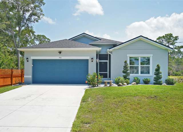 Property at 786 Titan Rd SE, Palm Bay, FL 32909, 4 beds, 3 baths