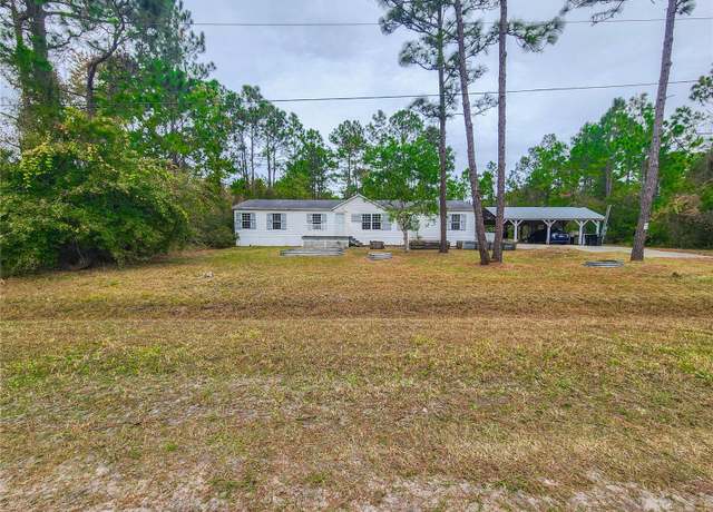 Property at 5636 Cherry Ln, Bunnell, FL 32110, 4 beds, 2 baths