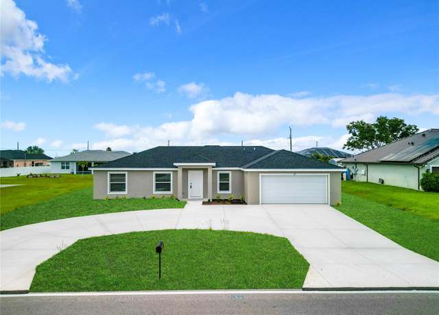 Property at 617 Tropicana Pkwy E, Cape Coral, FL 33909, 4 beds, 2 baths