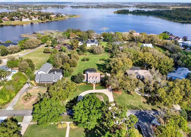 Property at 17416 Magnolia Island Blvd, Clermont, FL 34711, 5 beds, 4 baths