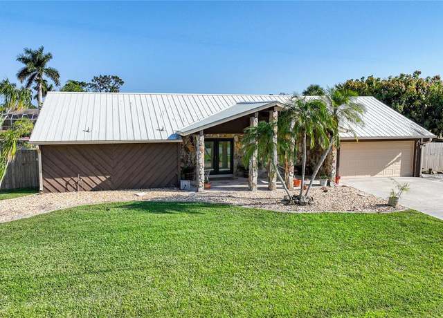Property at 12325 Mitchell Ter, Port Charlotte, FL 33981, 4 beds, 2.5 baths