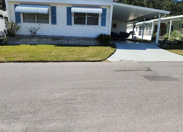 Property at 7 Cocos Plumosa Dr Unit A, Eustis, FL 32726, 3 beds, 2 baths