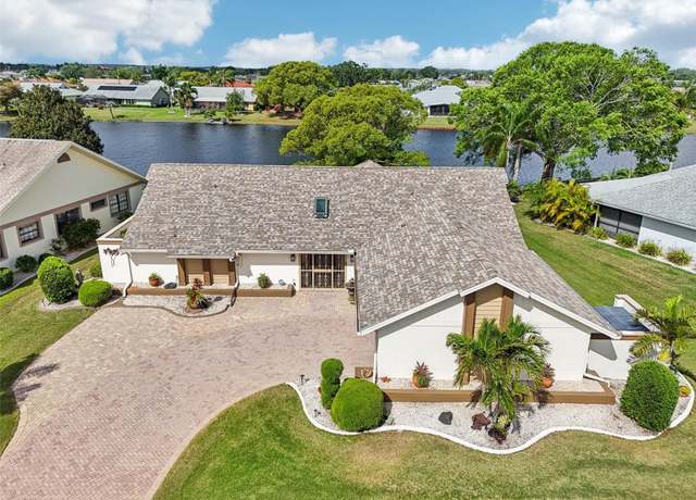 Property at 1928 E View Dr, Sun City Center, FL 33573, 3 beds, 2 baths