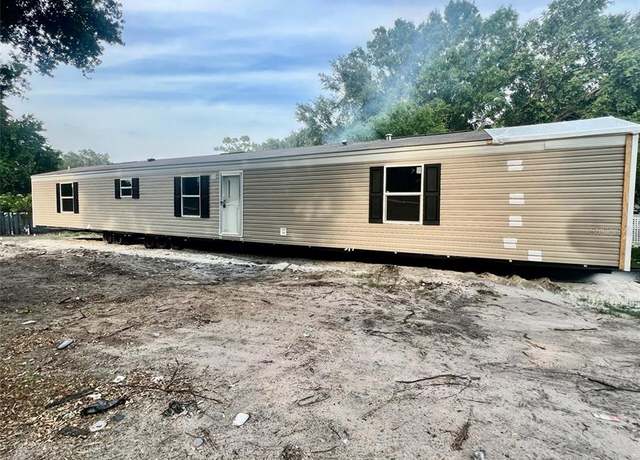 Property at 711 Whispering Pines Dr, Auburndale, FL 33823, 3 beds, 2 baths