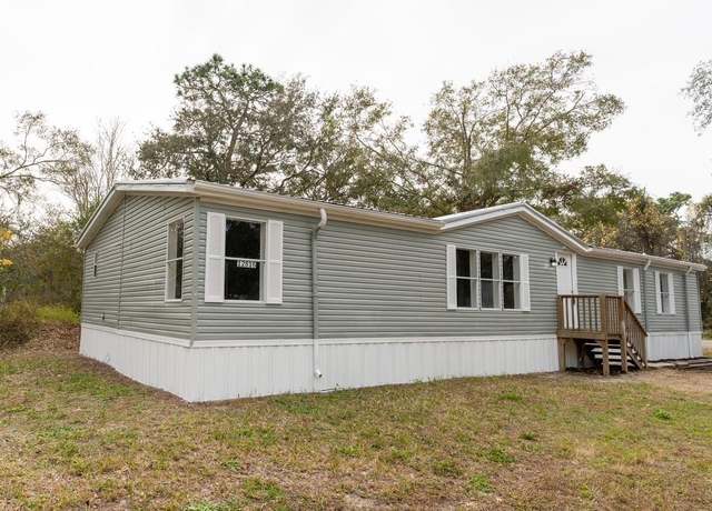 Property at 12816 Midvale Ave, New Port Richey, FL 34654, 4 beds, 2 baths