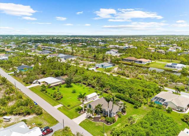 Property at 15521 Lakeland Cir, Port Charlotte, FL 33981, 5 beds, 3 baths