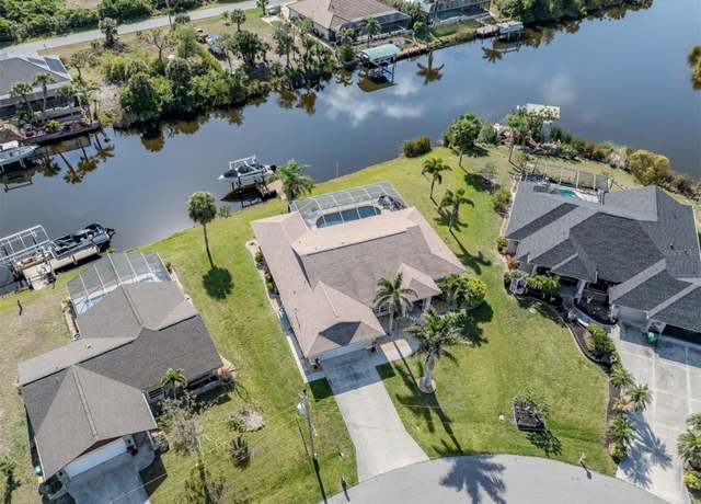 Property at 9542 Spring Cir, Port Charlotte, FL 33981, 3 beds, 2.5 baths