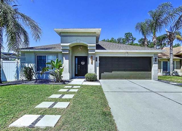 Property at 6205 Chapel Pines Blvd, Wesley Chapel, FL 33545, 4 beds, 2 baths