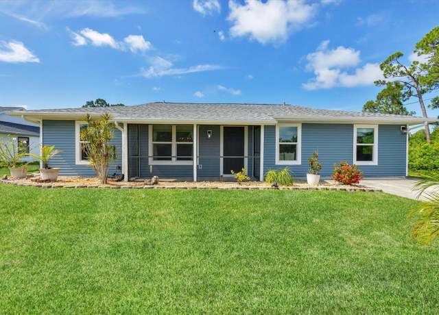 Property at 825 Calvert Ave NW, Port Charlotte, FL 33948, 4 beds, 2 baths