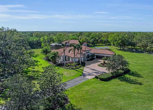 Property at 1110 79th St E, Palmetto, FL 34221, 4 beds, 4.5 baths
