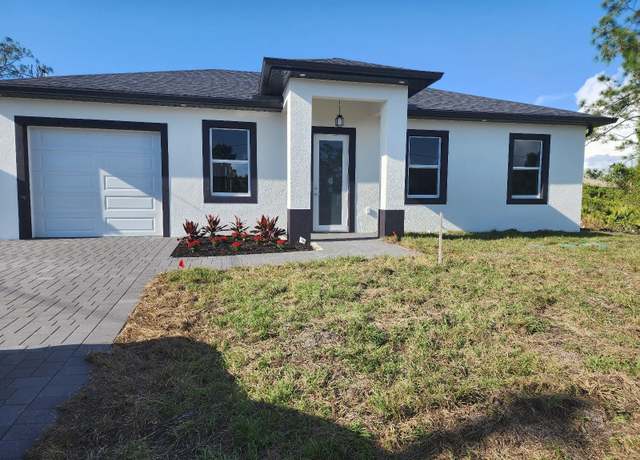Property at 3303 13th St W, Lehigh Acres, FL 33971, 3 beds, 2.5 baths
