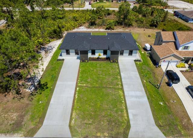 Property at 817/819 Eisenhower Blvd, Lehigh Acres, FL 33974, 6 beds, 4 baths