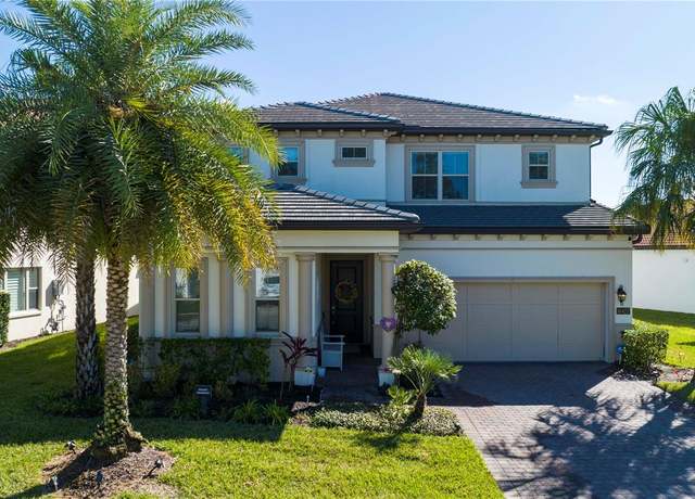 Property at 10427 Royal Cypress Way, Orlando, FL 32836, 5 beds, 4.5 baths