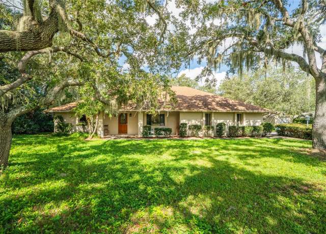 Property at 5822 Spruce Creek Woods Dr, Port Orange, FL 32127, 4 beds, 2 baths
