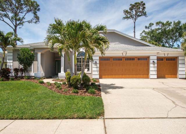 Property at 1793 Pipers Meadow Dr, Palm Harbor, FL 34683, 4 beds, 2.5 baths