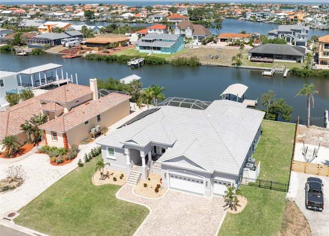 Property at 819 Birdie Way, Apollo Beach, FL 33572, 3 beds, 2 baths