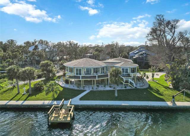 Property at 6119 Gnarled Oak Ln, Englewood, FL 34223, 3 beds, 4 baths