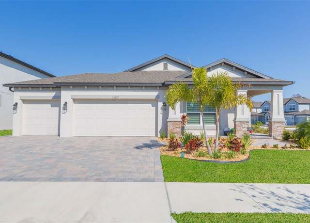 Property at 33277 Rosewood Bark Way, Wesley Chapel, FL 33545, 5 beds, 3 baths