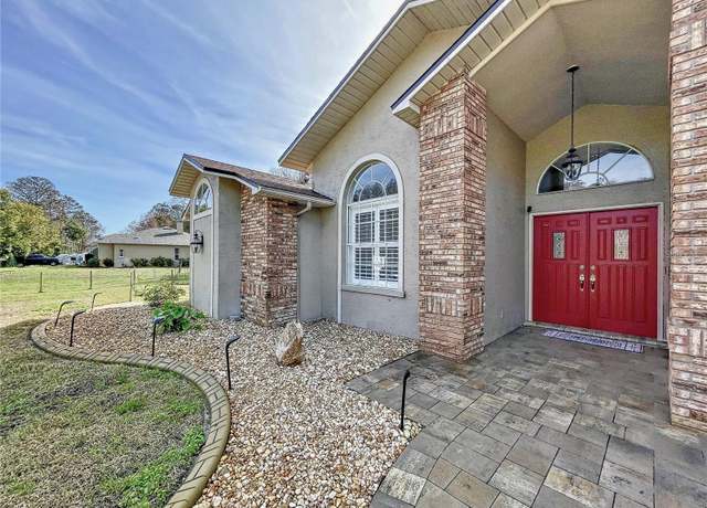 Property at 10060 Chip Ln, New Port Richey, FL 34654, 4 beds, 3 baths