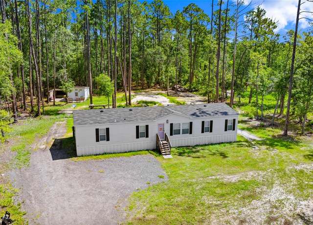 Property at 5608 Palm Ave, Bunnell, FL 32110, 5 beds, 3 baths