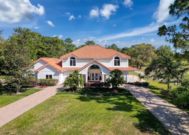 Property at 5198 Legend Hills Ln, Brooksville, FL 34609, 4 beds, 3 baths
