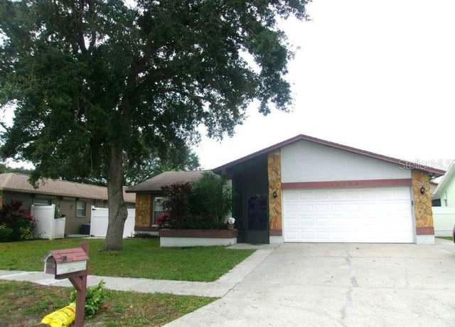 Property at 12172 Wild Acres Rd, Largo, FL 33773, 4 beds, 2 baths