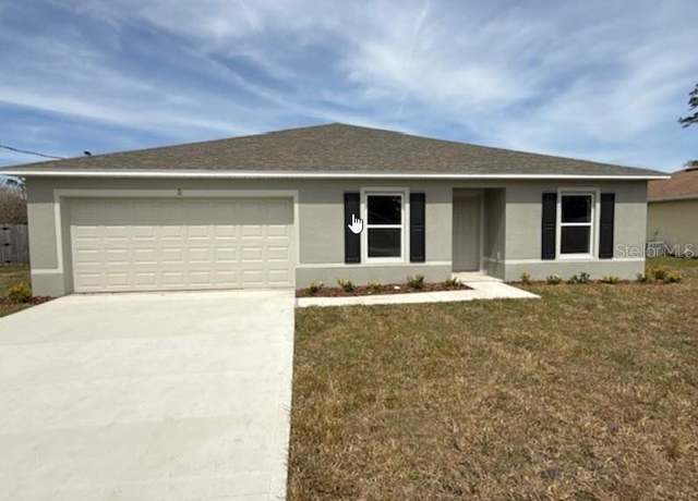 Property at 31 Pine Cedar Dr, Palm Coast, FL 32164, 4 beds, 2 baths