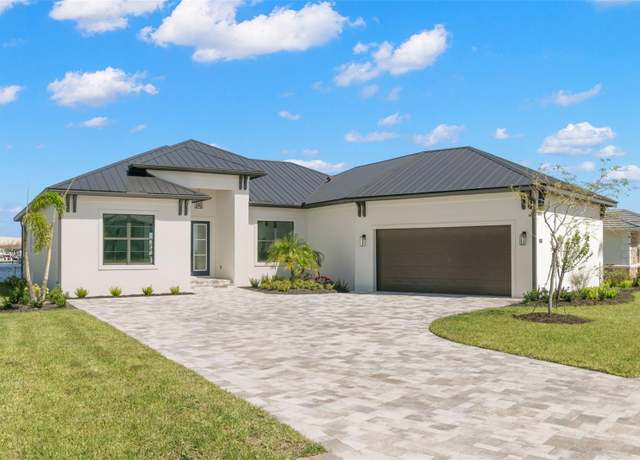 Property at 1810 4th St E, Palmetto, FL 34221, 3 beds, 3.5 baths