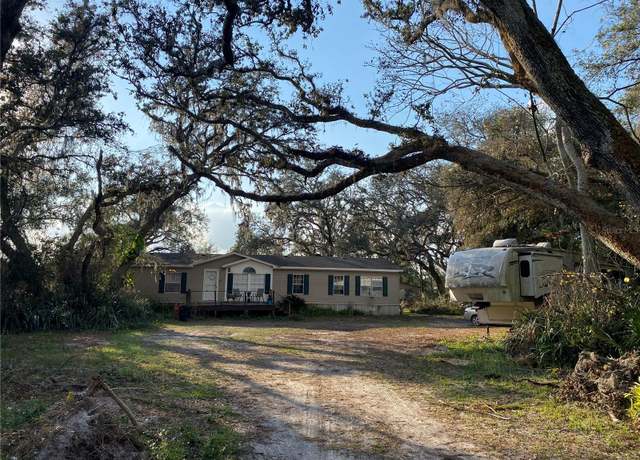 Property at 3207 Mazie Dr, Zephyrhills, FL 33541, 4 beds, 2 baths