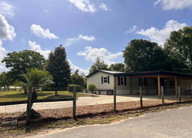 Property at 13700 Woodland Dr, Astatula, FL 34705, 3 beds, 2 baths