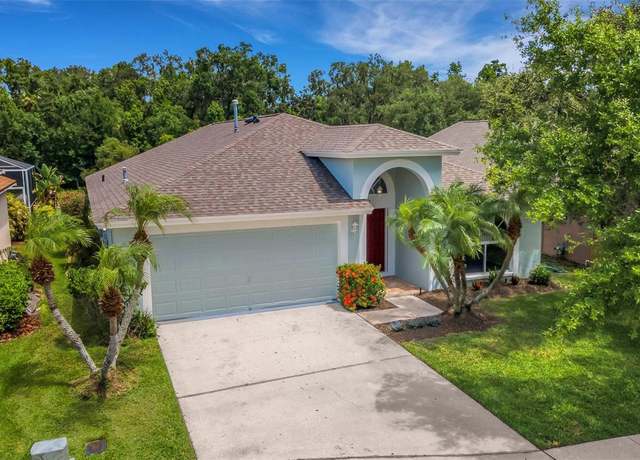 Property at 27542 Sky Lake Cir, Wesley Chapel, FL 33544, 4 beds, 2 baths