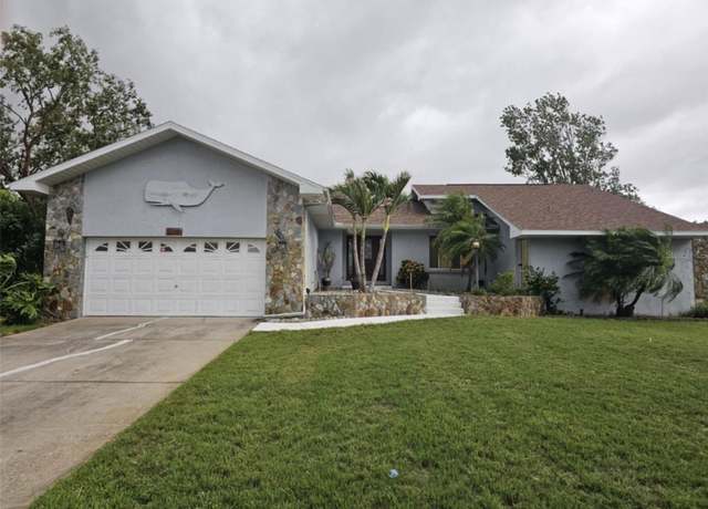 Property at 2210 Bayou Dr, Holiday, FL 34691, 4 beds, 2.5 baths