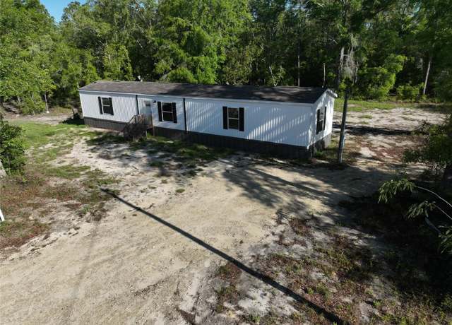 Property at 1400 NW 62nd Pl, Bell, FL 32619, 3 beds, 2 baths