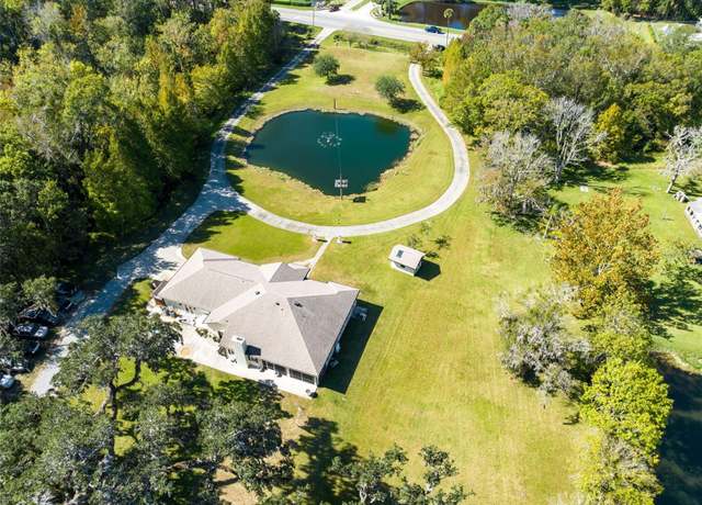 Property at 1780 Old Mission Rd, Edgewater, FL 32132, 4 beds, 3.5 baths