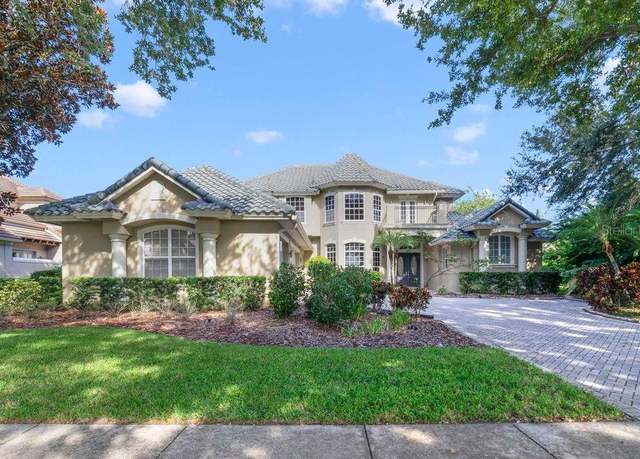 Property at 9102 Southern Breeze Dr, Orlando, FL 32836, 6 beds, 5.5 baths
