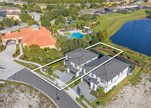 Property at 1205 Butterfly Orchid Rd, Davenport, FL 33837, 5 beds, 5 baths