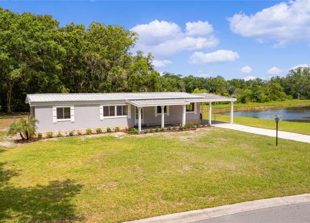 Property at 302 Ivanhoe Cir, Lady Lake, FL 32159, 3 beds, 2 baths