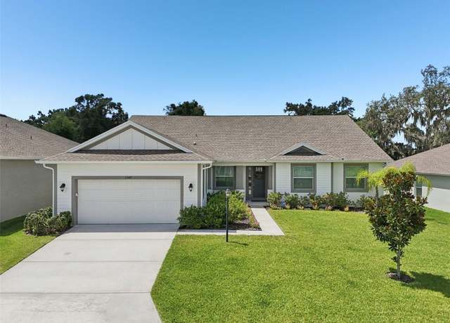 Property at 1047 Woodland Oaks Dr, Lakeland, FL 33813, 4 beds, 3 baths