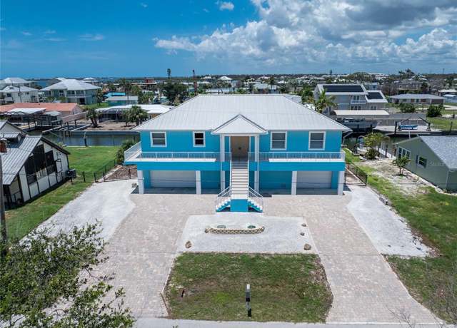 Property at 1930 Massachusetts Ave, Englewood, FL 34224, 3 beds, 2.5 baths