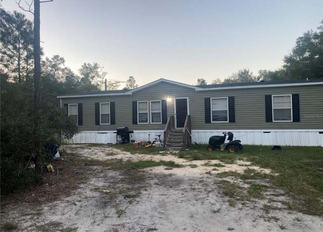 Property at 10831 NE 98th Ln, Archer, FL 32618, 5 beds, 3 baths