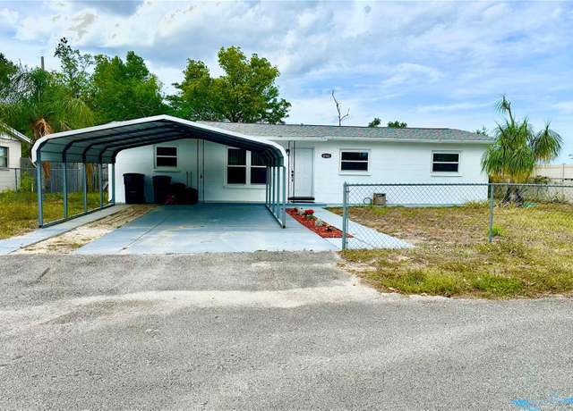 Property at 4100 Garden St, Titusville, FL 32796, 4 beds, 2 baths