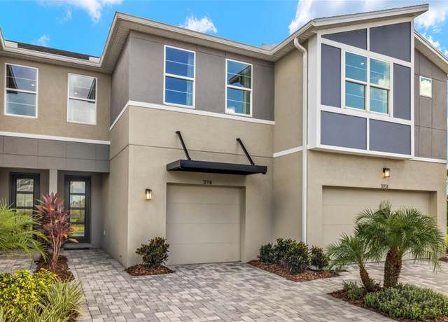 Property at 31556 Woodland Race Loop, Wesley Chapel, FL 33545, 3 beds, 2.5 baths