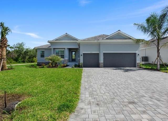 Property at 9275 Canna St, Port Charlotte, FL 33981, 3 beds, 2.5 baths