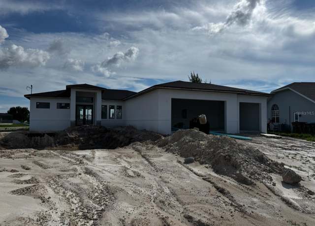 Property at 1924 NW 14th St, Cape Coral, FL 33993, 4 beds, 2.5 baths