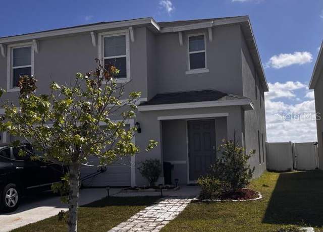 Property at 615 Sunlit Coral St, Ruskin, FL 33570, 5 beds, 3 baths